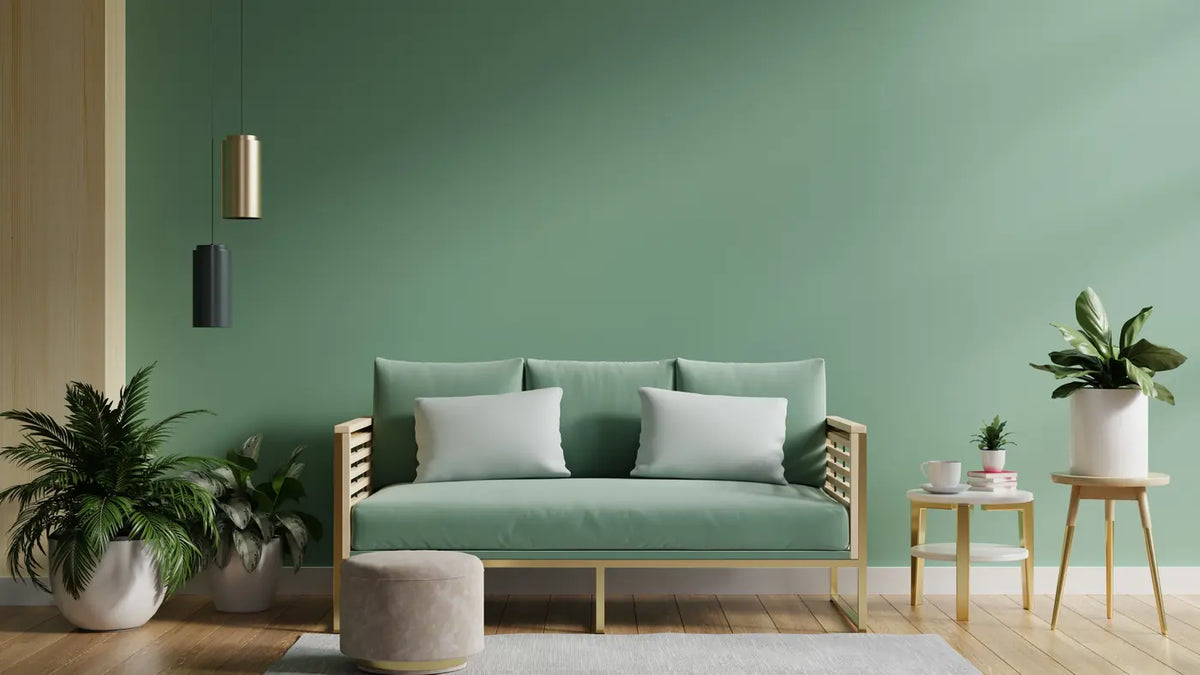 Grünes Wohnzimmer als Beispiel für moderne Wandfarben und Farbtrends